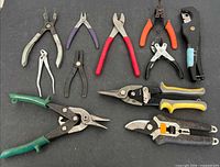 Full lot view showing 11 assorted hand tools