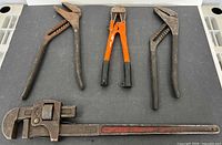 Group shot of four tools on tabletop