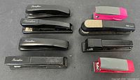 All eight staplers laid out for overview