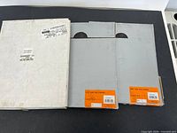 Three boxes of sandpaper displayed