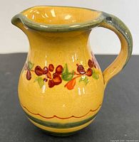 Front profile of yellow floral pitcher
