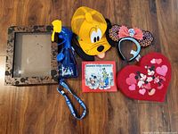Group shot showing all six Disney items on floor