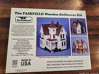 Front of box showing product name, image of finished dollhouse, key features