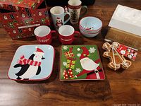 Full view of dishware set, bowls, mugs, plates and packaged mats