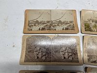 Two stereoviews: Chilkoot Pass miners, Plum Blossoms Japan