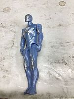 front view of blue and silver robot action figure