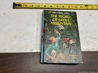 Front cover with tape measure for scale