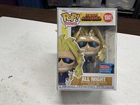 Front view of boxed Funko Pop All Might showing figure and 2021 Fall Convention Limited Edition sticker