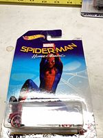 Front of sealed Hot Wheels Marvel Spider-Man: Homecoming blister card showing red car