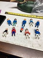 Top view of all ten figures laid out