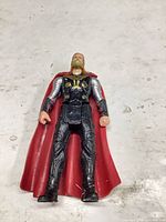 Front view of Thor action figure showing armor detail and paint wear