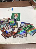 Pile of Marvel VS System cards spread on tabletop