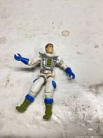 Front view of articulated action figure showing colors, armor detail, wear