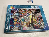 Front of Ravensburger 1000-piece puzzle box showing title and artwork