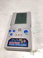 Front view showing screen, controls, title label