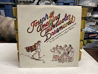 Front cover of Joseph And The Amazing Technicolor Dreamcoat LP showing artwork and title.