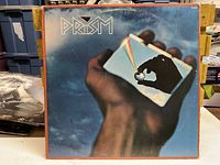 Front jacket of Prism vinyl album