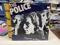 Front cover showing album title and band members