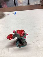 Front view of Skylanders Prism Break figure showing crystals and base