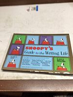 Front cover showing title and Snoopy illustrations