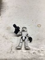 Front view of Stormtrooper figure holding blaster
