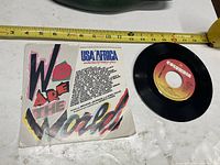 Front of sleeve and record showing labels and artwork