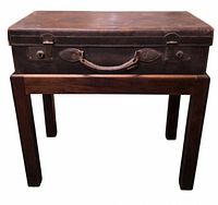 Front view of leather briefcase side table