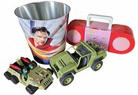 All items group shot showing bucket, boombox playset closed, jeep, six-wheel vehicle