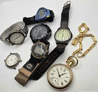 Front view of all watches and chain laid out