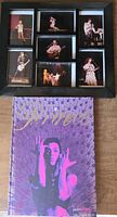 Front view of coffee table book and framed concert photographs