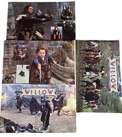 Three sides of posters showing Val Kilmer action scene, Warwick Davis cliff scene, horse charge scene, Kraft logo
