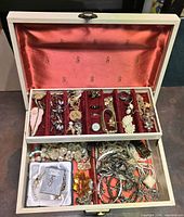 Open jewelry box showing all contents