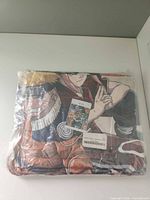 sealed Naruto anime blanket folded in plastic packaging