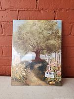 Front view of sealed canvas showing tree landscape artwork