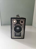 Front view showing lens, viewfinder windows and Brownie Target Six-16 labeling