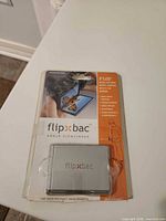 Front of packaged Flipbac angle viewfinder showing branding and product