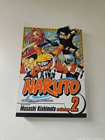 Front cover showing title, volume number, author name, and character artwork