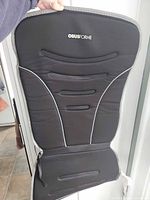 Front view of ObusForme heated seat cushion showing branding and pad detail
