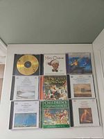 Front view of nine CDs arranged in grid