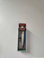 Front view of packaged Rapala Original Floating lure 7B