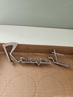 Full view of Regent emblem showing break