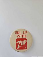 Front view showing text, logo and cream color