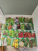 All 28 seed packets laid out for count verification