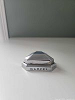 Closed Marvel diamond-shaped ring box front view