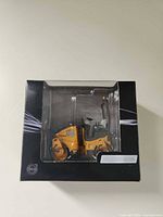 Front view of boxed Volvo road roller model showing Collectors Edition labeling