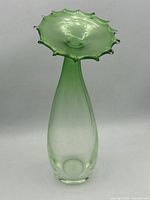 Full view of vase showing gradient coloration and ruffled rim