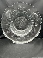Full view of frosted glass bowl showing flamingo motif and scalloped rim
