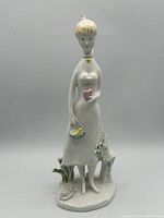 Full view of figurine on base