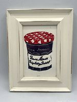Full framed view of linocut print showing Bonne Maman jar