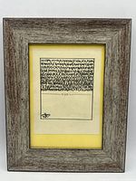 Full view of framed drawing with yellow mat and rustic wood frame